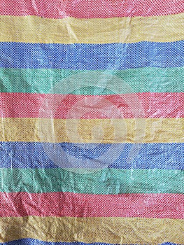 ColorfulÃ¢â¬â¹ plasticÃ¢â¬â¹ woven sack textureÃ¢â¬â¹ photo